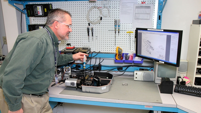 Kaiser Engineer optimizing a spectrograph Kaiser Engineer optimizing a spectrograph
